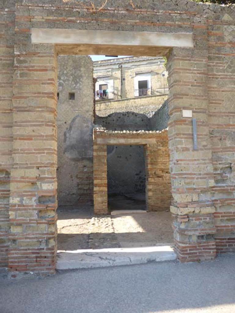 II.2 Herculaneum, September 2015. Present day entrance doorway, but originally this would have been the posticum doorway from the rear of the peristyle. The main doorway would have been entered from Cardo II, but has not yet been excavated into the open air.